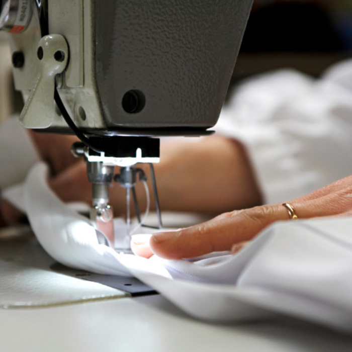 DBL Miettextilien ausbessern.jpg